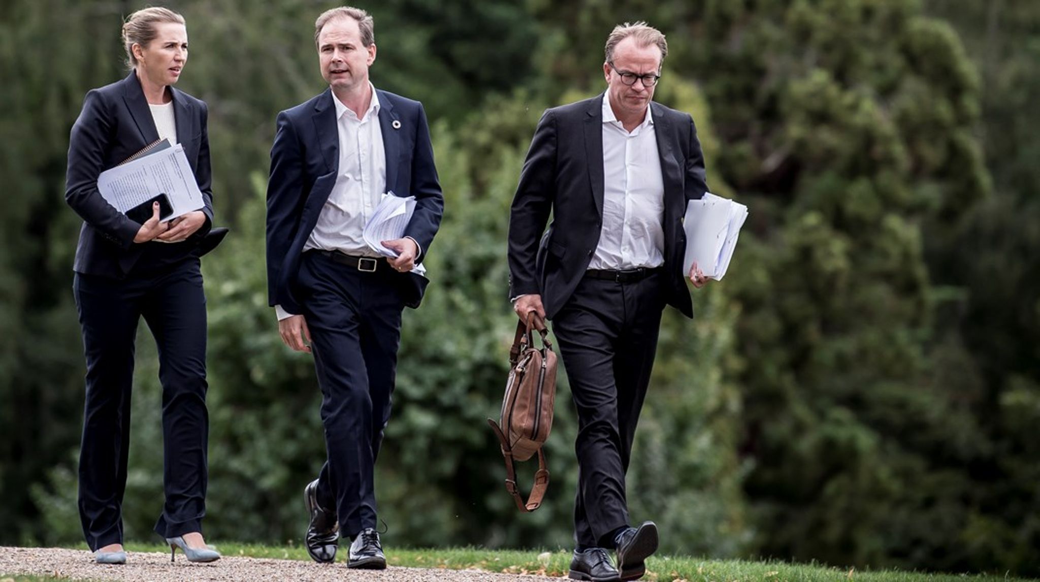 Martin Rossen (th.) er en af dem, der skiftede jobbet som spindoktor ud med et job i det private erhvervsliv.&nbsp;Efter at have været spindoktor for&nbsp;statsminister Mette Frederiksen (tv.) skiftede han nemlig til et job i virksomheden Danfoss.&nbsp;