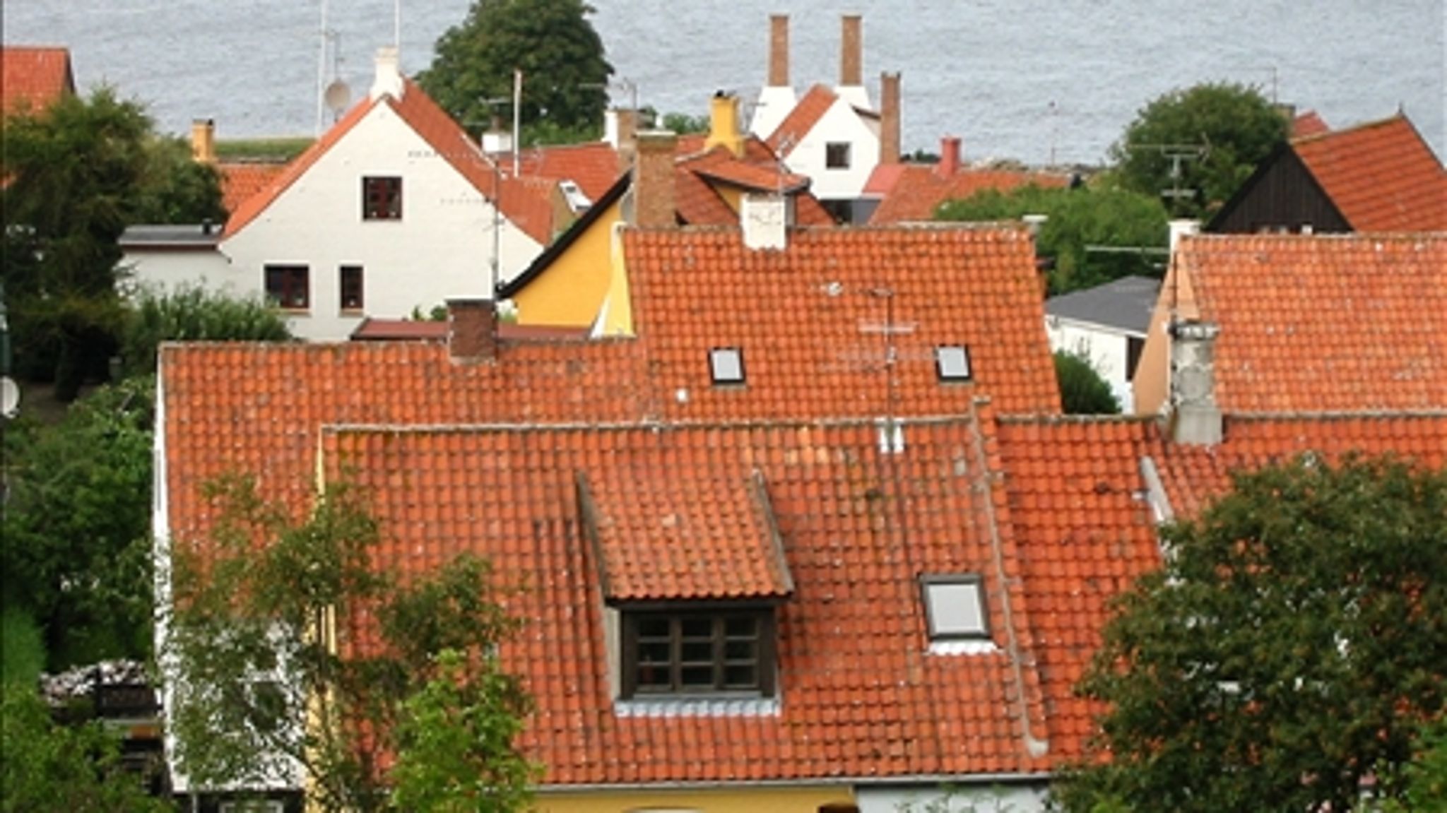 Danske huse stiger i værdi, men skal der betales skat af den stigning? Danskerne siger nej.