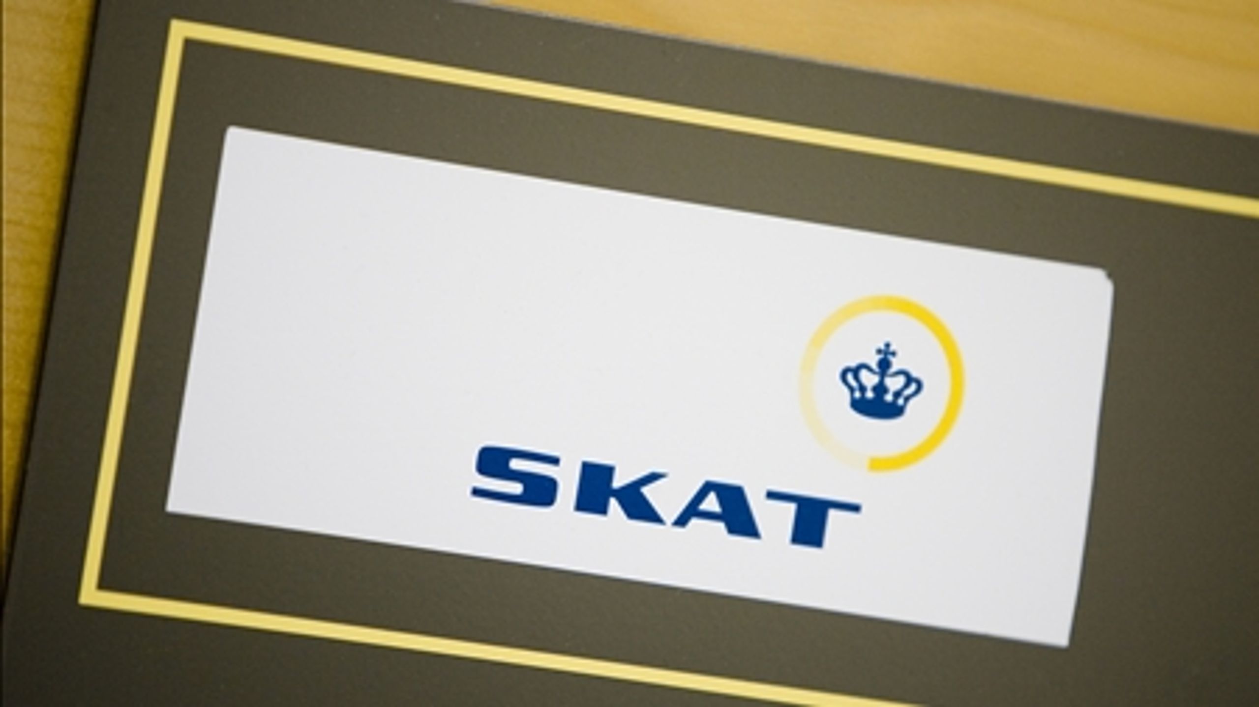 Regeringens mål om en global skat anses for urealitisk af Venstre og Enhedslisten.