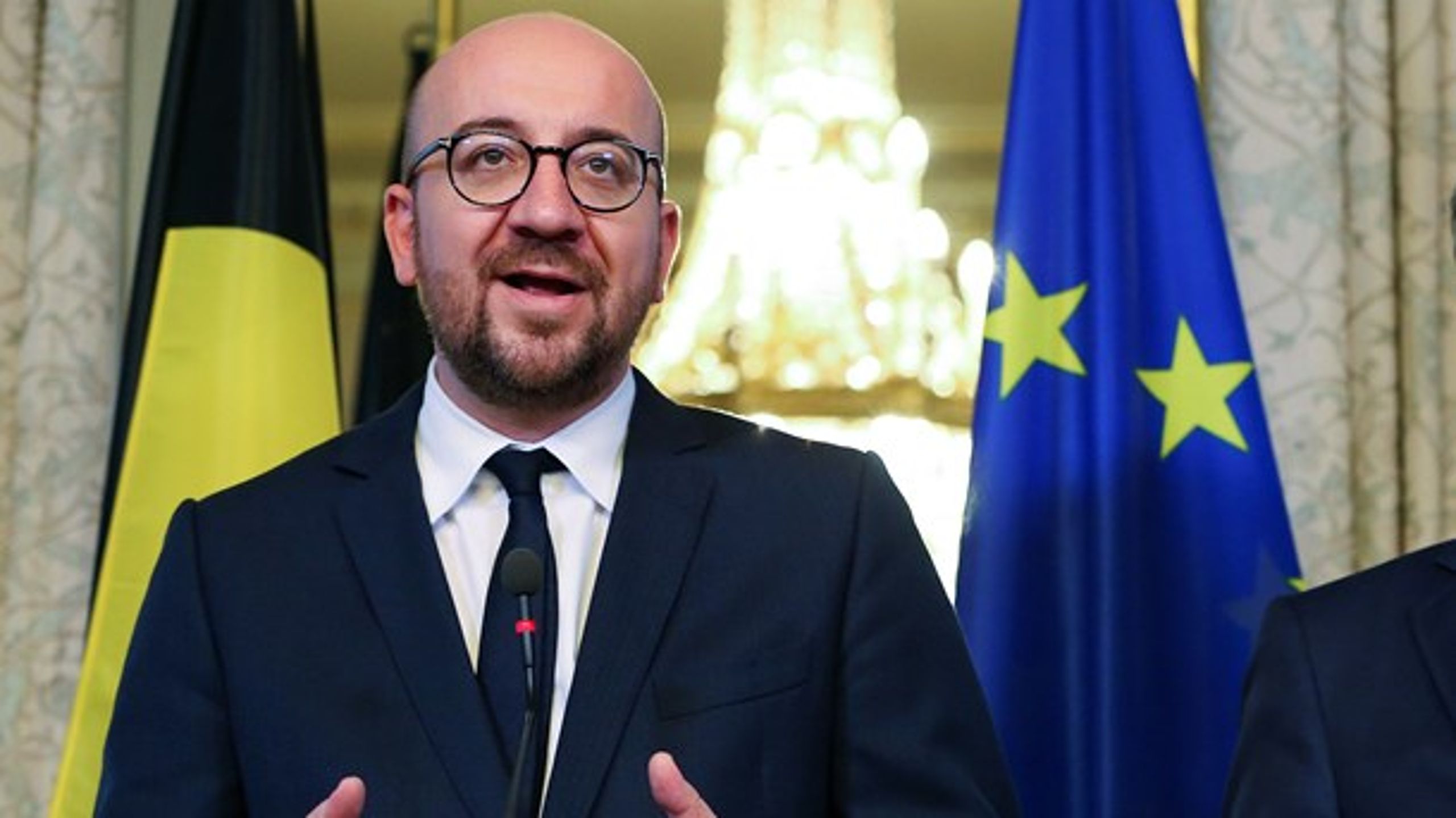 Belgiens premierminister, Charles Michel, har hele tiden støttet CETA-aftalen. Men den belgiske region Vallonien har blokeret for, at han har kunne tiltræde aftalen.