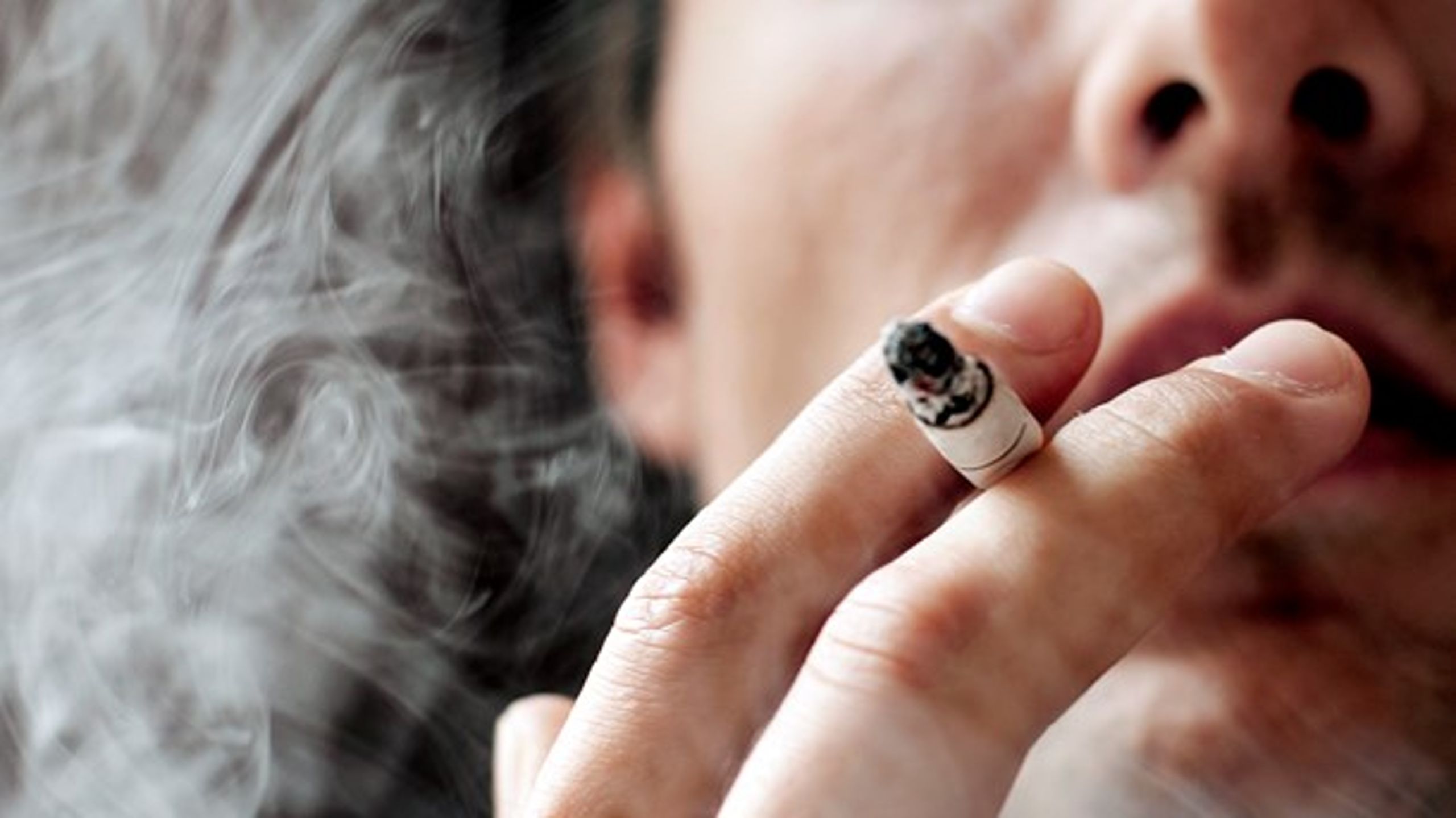 Hver femte 15-årige i Danmark ryger mindst en gang om ugen. 
