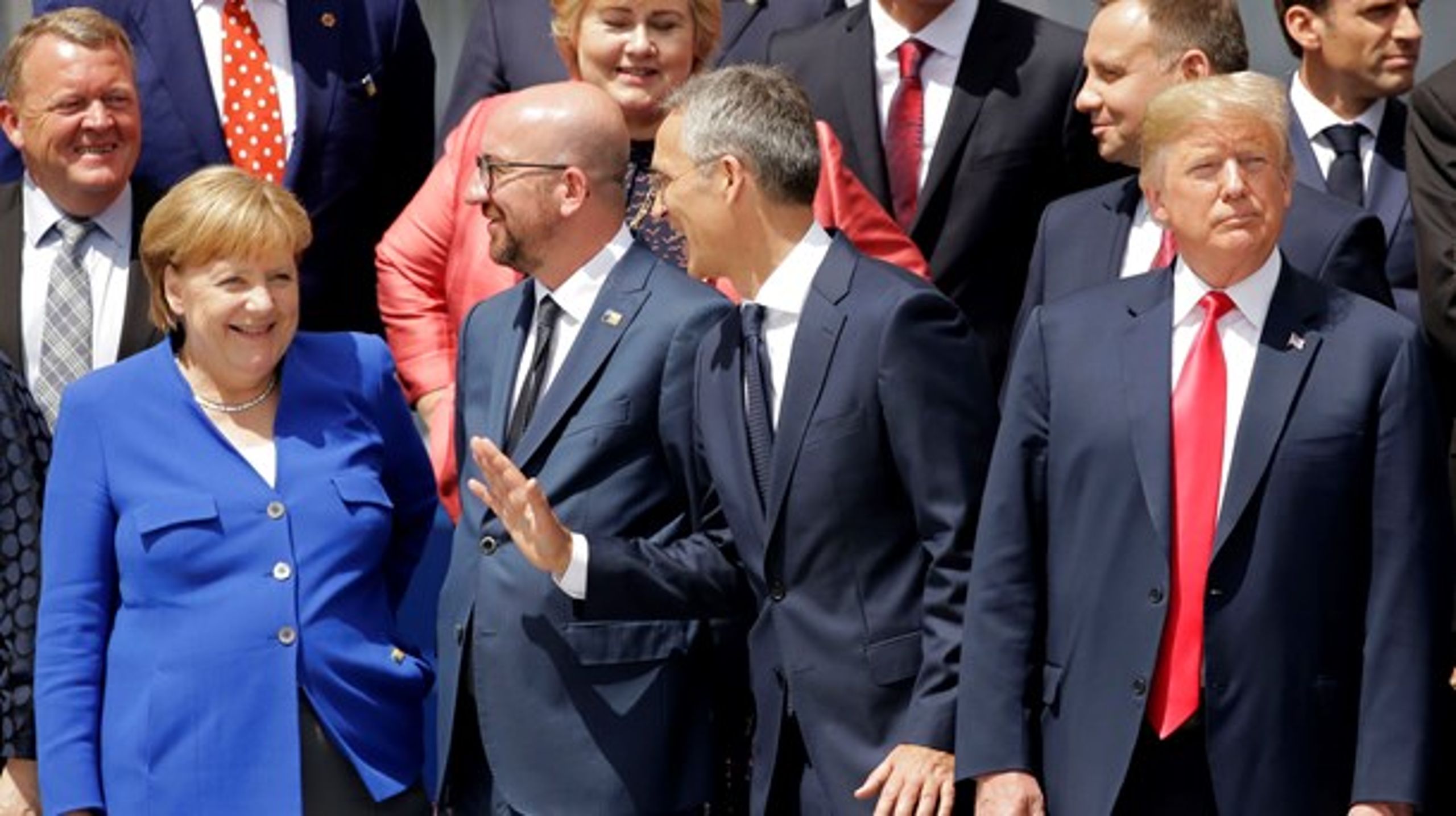 Tysklands kansler Angela Merkel (t.v.), Belgiens premierminister Charles Michel, Nato's generalsekretær Jens Stoltenberg og USA's præsident Donald Trump (t.h.) ved Nato-topmødet i juli. I baggrunden yderst til venstre Danmarks statsminister Lars Løkke Rasmussen.&nbsp;