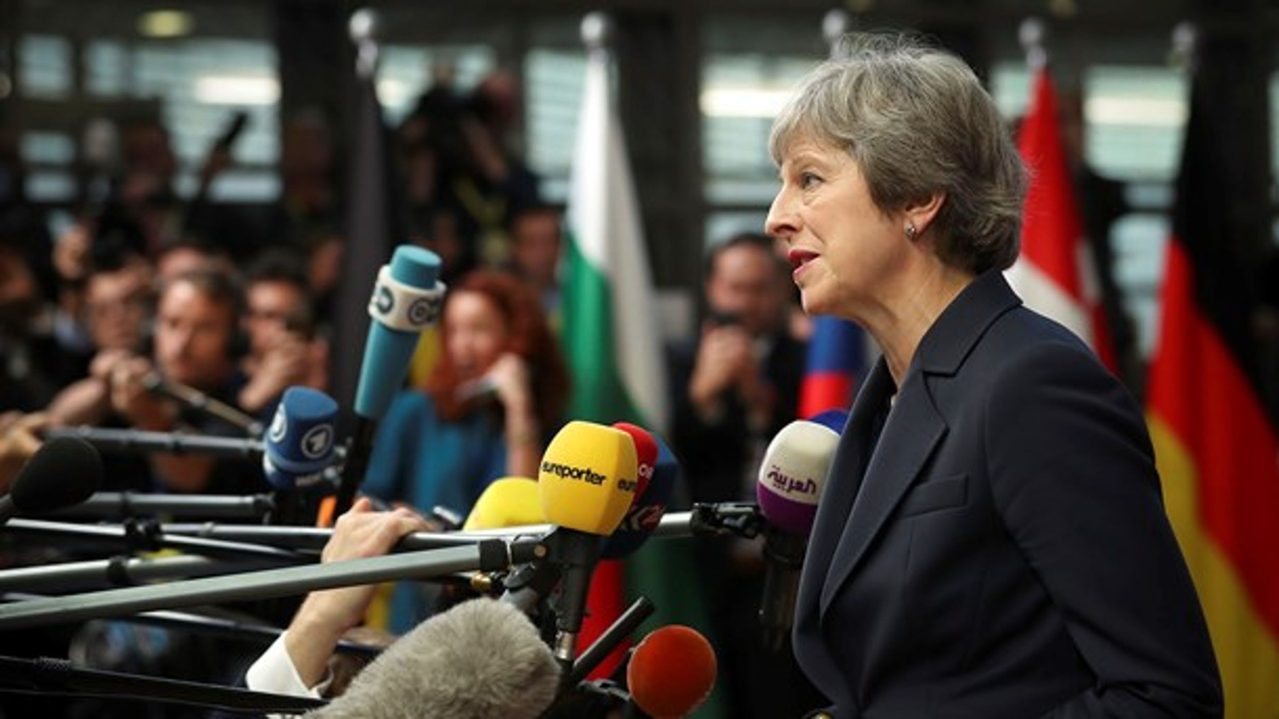 Den britiske premierminister, Theresa May, havde lagt den krigeriske tone fra sig, som hun lagde for dagen, sidste gang EU-cheferne mødtes.