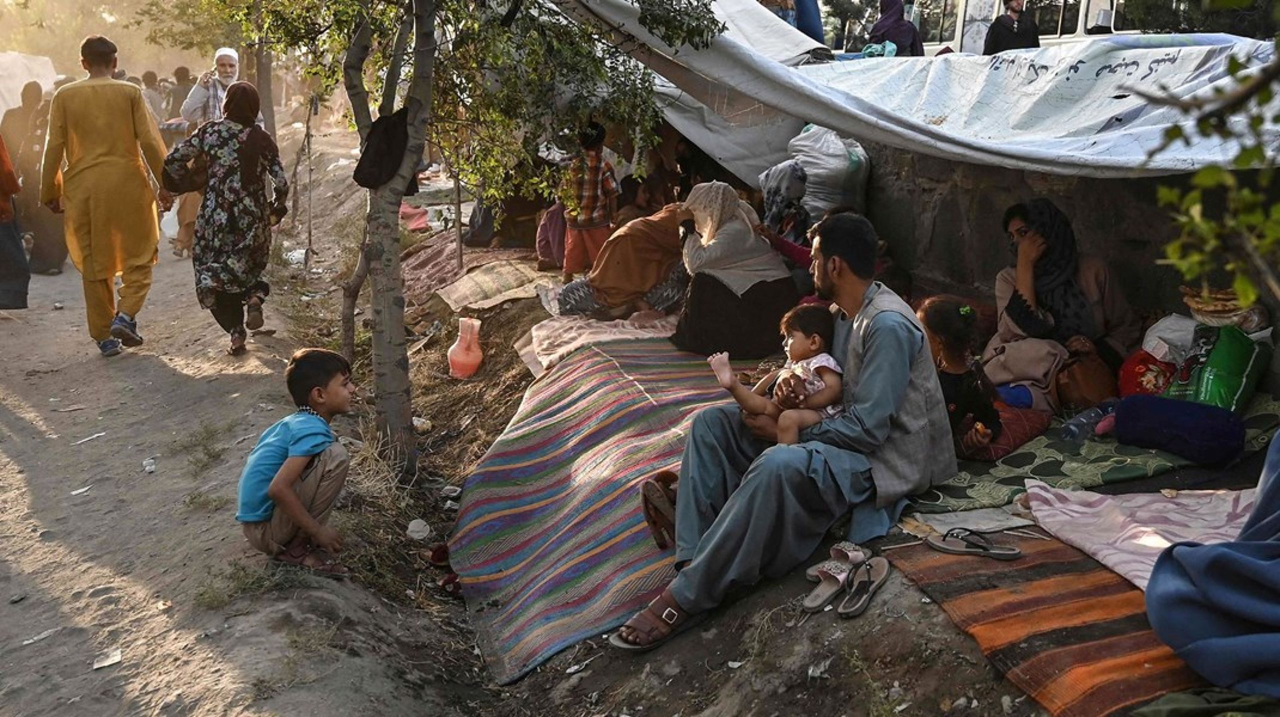 Internt fordrevne afghanske familier i Kabul, der er flygtet fra krigen mellem Taliban og de afghanske sikkerhedsstyrker.